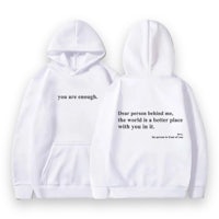 a white hoodie with a quote that says you are enough